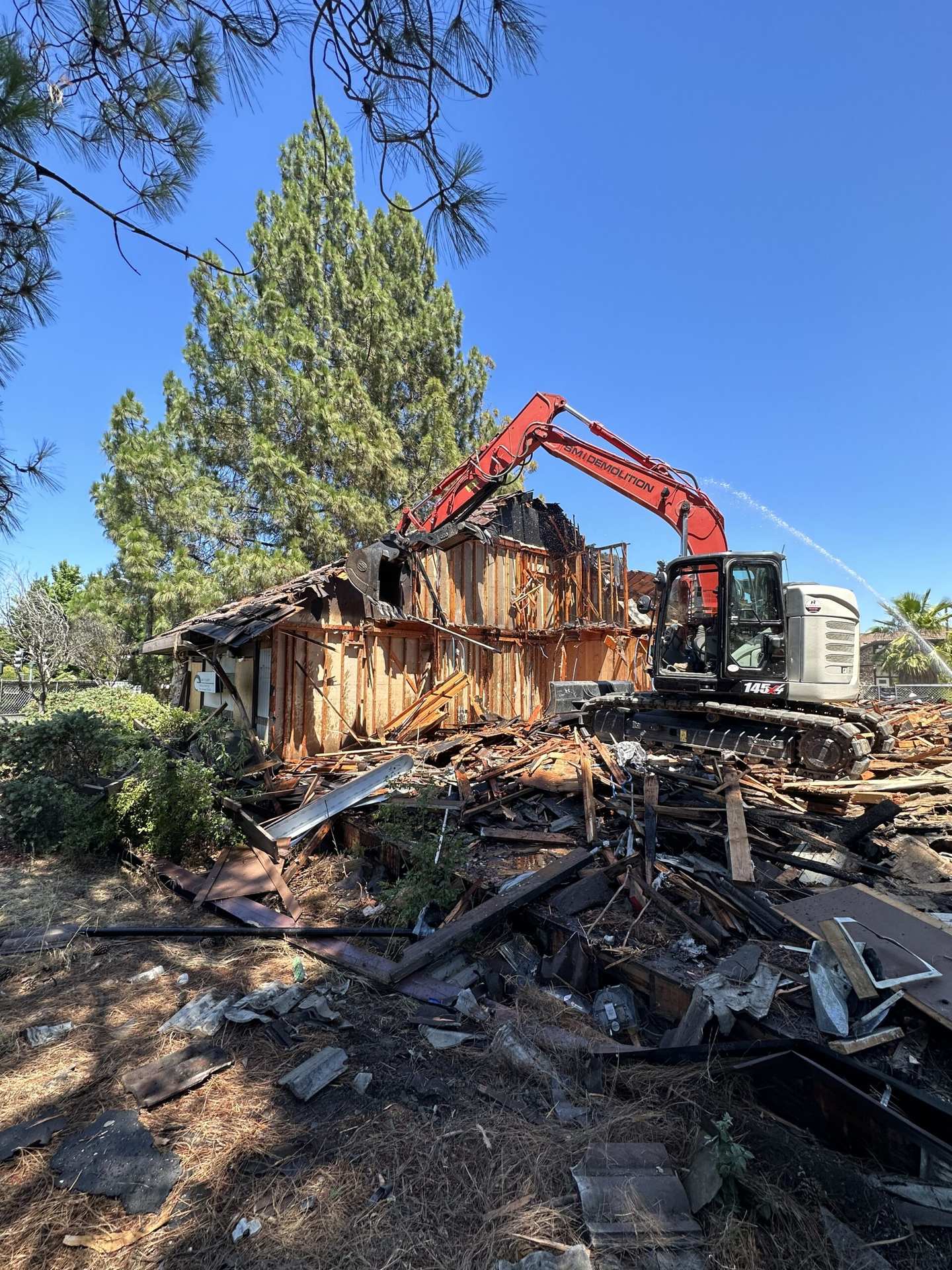 SMI Demolition crew demolishing a residential structure in the Bay Area